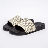 Black slides with gold pattern on a white background