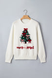 Off-white “Merry and Bright” Christmas sweater with a festive tree graphic on a hanger.