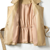 Beige leather jacket with pink lining on a white background