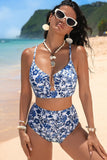 Woman in a blue floral bikini on a beach
