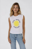 Woman wearing a sleeveless shirt with 'Good Morning Sunshine' graphic on a white background