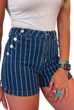 A close-up of a person wearing dark blue denim shorts with thin white vertical pinstripes and decorative silver-tone buttons on the side, paired with a white top against a plain white background.