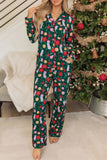 Woman in long-sleeve pajamas with festive Christmas print beside decorated tree