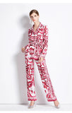 Woman wearing a red and white patterned outfit on a white background
