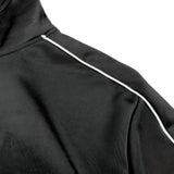Black jacket with white piping on a white background