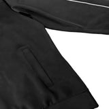 Close-up of a black jacket with a white stripe on a white background
