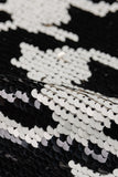 Close-up of black and white sequin fabric