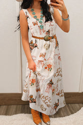 Woman wearing a floral dress with a belt, standing against a neutral background.