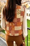 Woman viewed from behind wearing warm autumn patchwork quilted vest