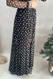 Flowing black and white polka dot mesh maxi skirt with long sheer sleeves