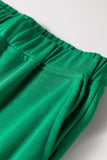 Elastic waistband detail on bright green wide leg lounge pants