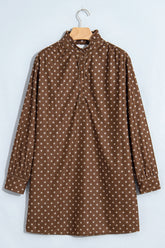 Brown polka dot shift dress with ruffle stand collar and button placket, front flat view