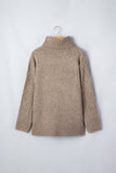 Beige knit turtleneck sweater with textured cable sleeves on wooden hanger