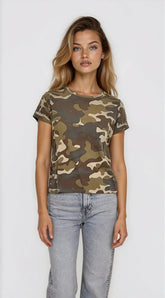 Woman wearing a camouflage t-shirt and light blue jeans on a white background
