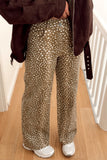 Brown and cream cheetah spot print wide leg jeans with white sneakers