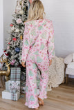 Back view of woman in pink pajamas with Christmas tree and bow print.