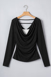 Black long-sleeve cowl-neck top with double back straps on wooden hanger.