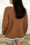 Back view of chestnut oversized knit cardigan with cream contrast hem