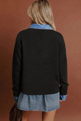 Back view of woman in black knit sweater with denim shirt and skirt.