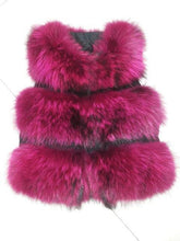 Pink fur vest on a white background