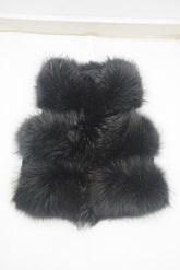 Black fur vest on a white background