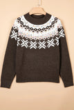 Dark brown knit sweater with a white Fair Isle yoke and snowflake patterns.