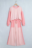 Pink gingham color block set on a hanger, front view