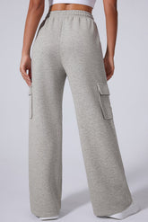 Back view of person in light gray wide-leg cargo sweatpants.
