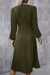 Back view of jungle green long sleeve midi dress with balloon sleeves