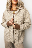 Khaki leopard corduroy jacket worn open with four patch pockets