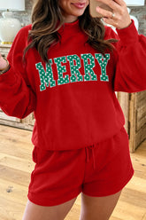 Woman in red MERRY letter patch mock neck sweatshirt and shorts set, mirror selfie