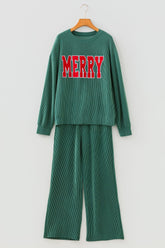 Green outfit with 'MERRY' text on a hanger against a white background