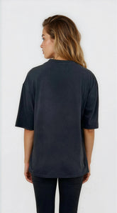 Person wearing a dark blue t-shirt on a white background