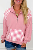 Pink plaid patchwork quarter zip sweatshirt with gingham kangaroo pocket, front view