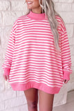 Pink and white striped mock neck oversized tunic sweatshirt, front view