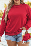 Woman wearing red crewneck sweatshirt with light blue denim shorts outdoors, with outfit inset.