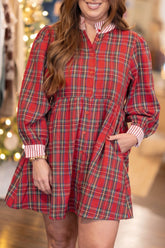Woman wearing a plus size red plaid mini dress with striped ruffle collar and pockets
