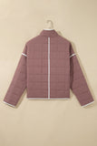 Dusty rose quilted puffer jacket on white hanger, featuring a back view with white piping.