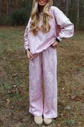 Women's pink abstract print sweatshirt and side stripe wide leg pants set, front view
