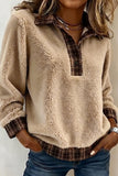 Women's beige sherpa plaid trim pullover with blue jeans, styled view