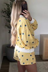 Yellow polka dot lounge set, side view on model