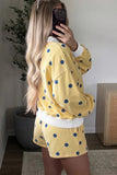 Yellow polka dot lounge set, side view on model