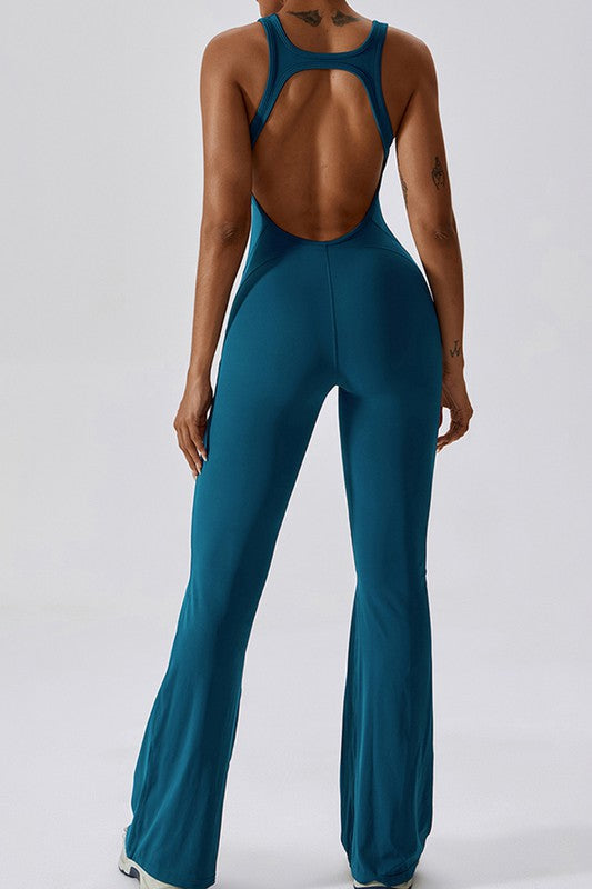 Women Solid Flared Trousers Cut Out Back Fitness Jumpsuit Zarnesh