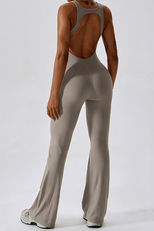 Women Solid Flared Trousers Cut Out Back Fitness Jumpsuit Zarnesh