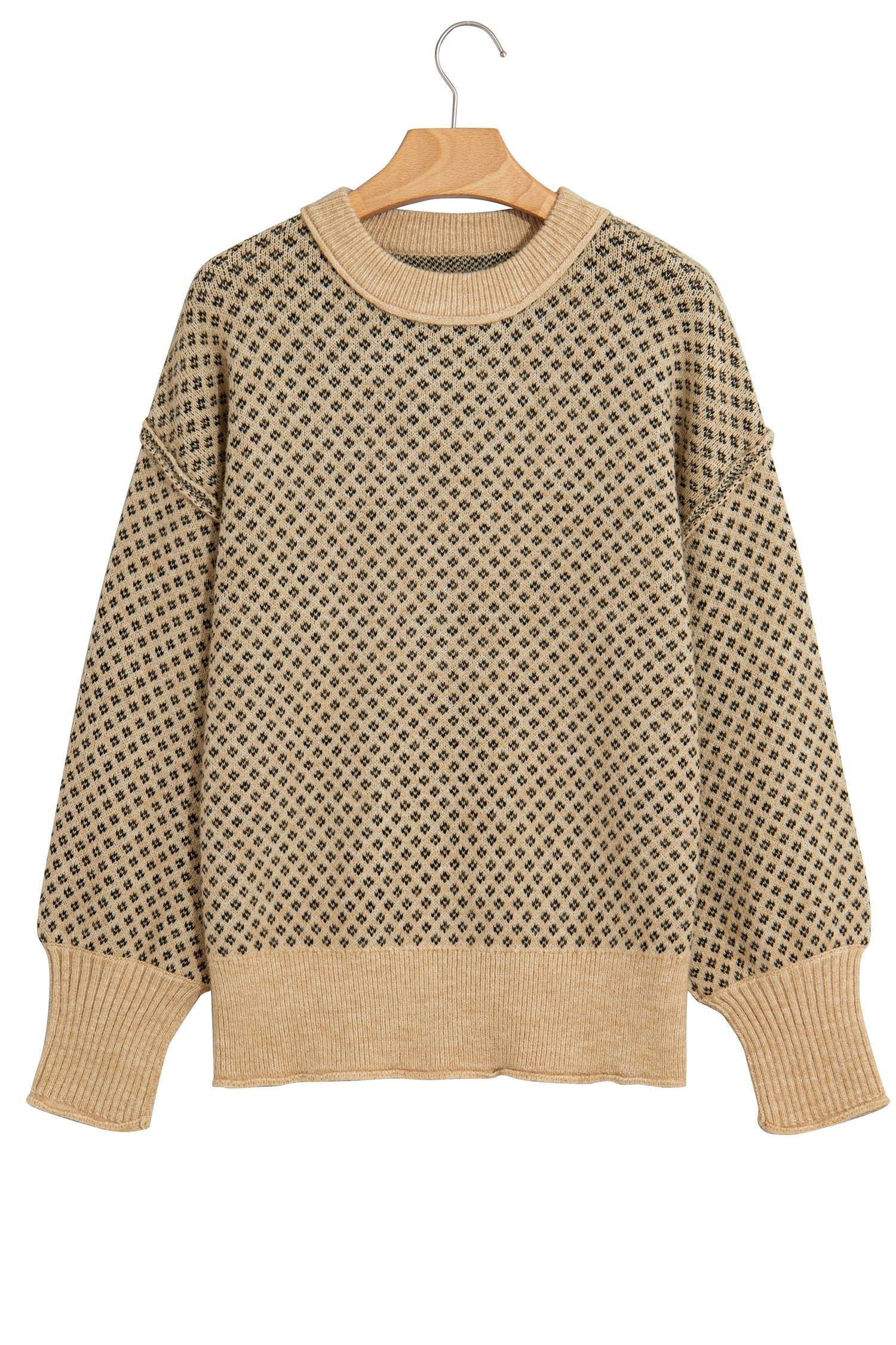 A beige and brown patterned knit sweater with ribbed collar, cuffs, and hem, hanging on a wooden hanger against a white background.