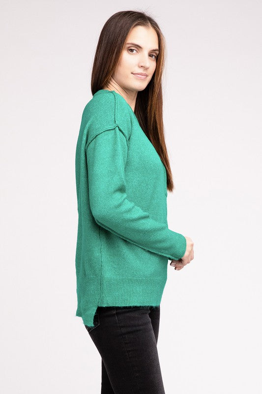 Women Melange Hi-Low Hem Round Neck Sweater | Zarnesh