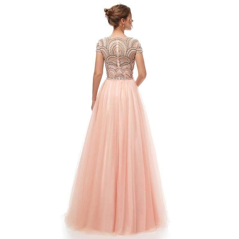 Pink evening gown with intricate top design on a white background