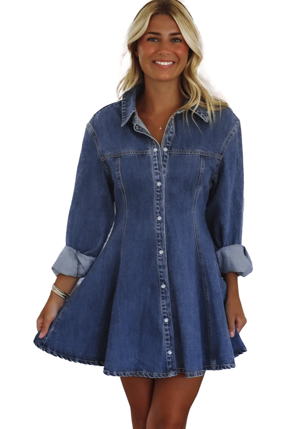Woman wearing a denim dress on a white background