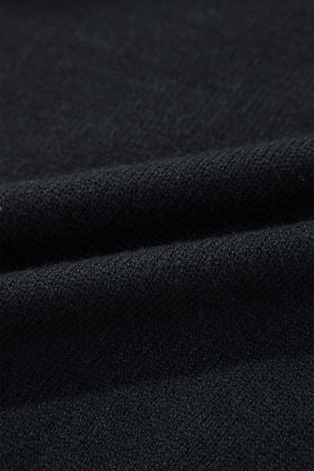 Close-up of dark fabric texture