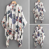Floral kimono-style garment on a gray background